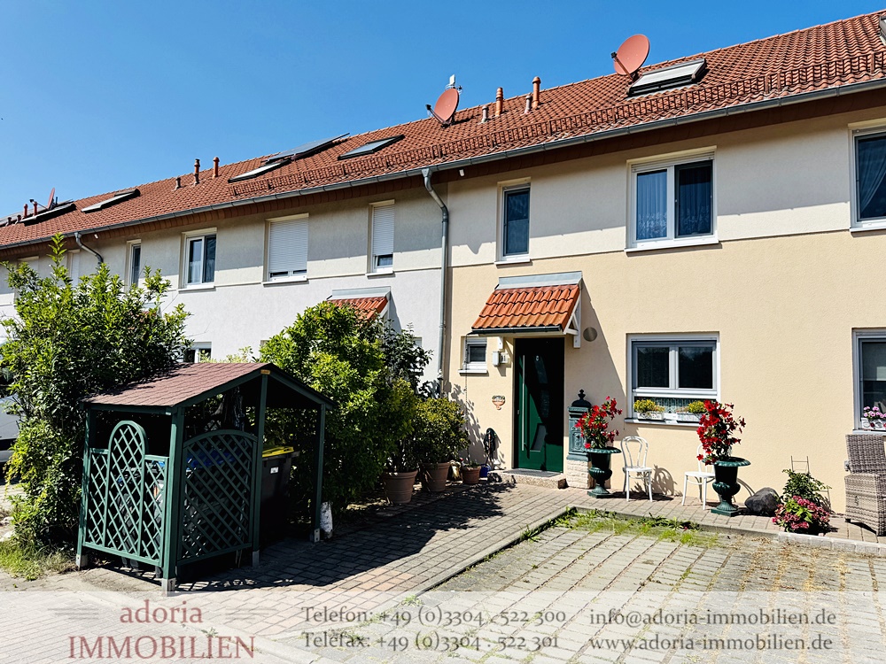 Sehr gepflegtes Reihenmittelhaus mit Wintergarten und traumhaftem Feldblick